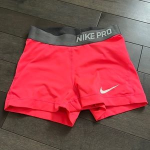 Neon pink Nike pros
